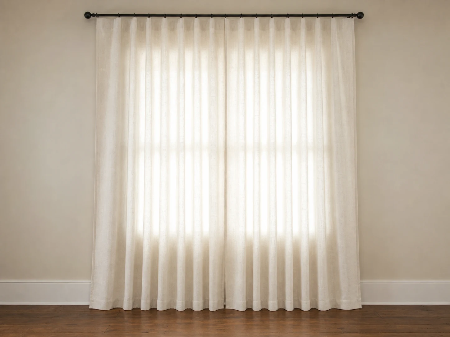 Closed linen-look curtain pair with even full folds and floor-skimming hems